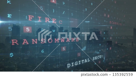 Displaying red RANSOMWARE text overlay above urban skyline at dawn, with grid of cybersecurity code 135392559