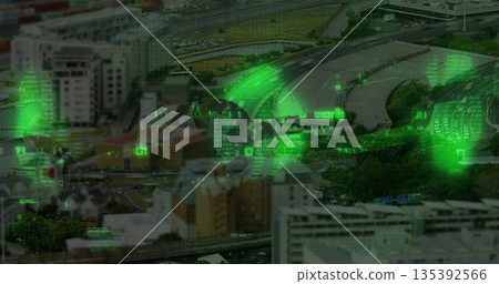 Highlighting aerial highway interchange weaving through dense city blocks, with green code overlays 135392566