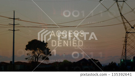 Displaying ACCESS DENIED overlay above suburban skyline at dusk, with utility poles and binary code Displaying ACCESS DENIED overlay above suburban skyline at dusk, with utility poles and binary code 135392641