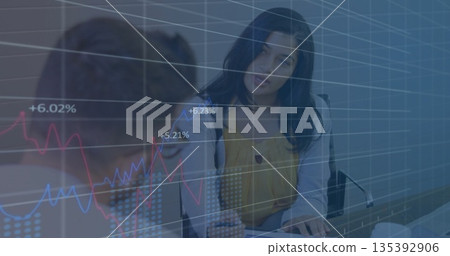 Businesswoman in white blazer holding smartphone and analyzing metrics in meeting room, with laptop Businesswoman in white blazer holding smartphone and analyzing metrics in meeting room, with laptop 135392906