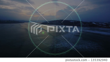 Displaying semi-transparent digital radar overlay graphic scanning aerial sea at dusk, with waves Displaying semi-transparent digital radar overlay graphic scanning aerial sea at dusk, with waves 135392940
