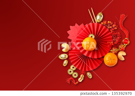 Celebration of Chinese New Year with vibrant red and gold items 135392970