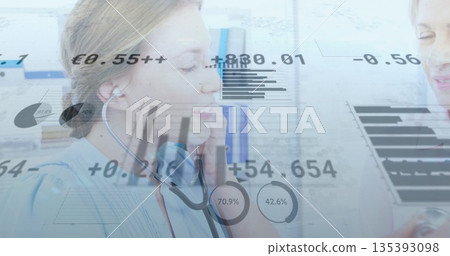 Using stethoscope, provider in scrubs examining patient chest at office bookcase, with digital data 135393098