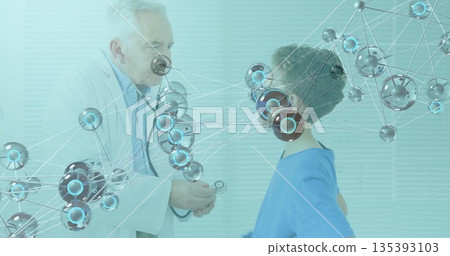 Listening white coat doctor placing stethoscope on boy's chest in exam room, with network overlay Listening white coat doctor placing stethoscope on boy's chest in exam room, with network overlay 135393103