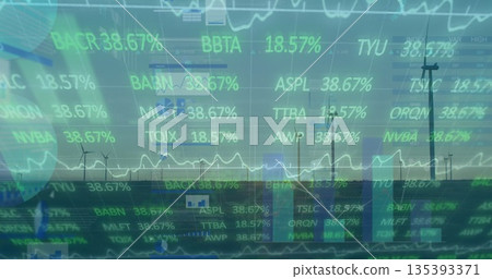 Showing row of wind turbines spinning on grassy plain under pale sky, overlaying financial data Showing row of wind turbines spinning on grassy plain under pale sky, overlaying financial data 135393371