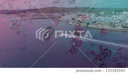 Cutting small motorboat leaving wake trail through sea near hillside town, with sphere-line mesh 135393593