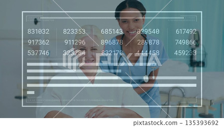 Nurse in scrubs supporting patient wearing gown in wheelchair at hospital bedside, with stethoscope Nurse in scrubs supporting patient wearing gown in wheelchair at hospital bedside, with stethoscope 135393692