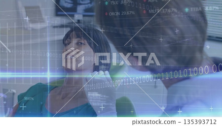 Reclining woman wearing teal top and receiving intraoral exam in dental room, with digital overlays Reclining woman wearing teal top and receiving intraoral exam in dental room, with digital overlays 135393712