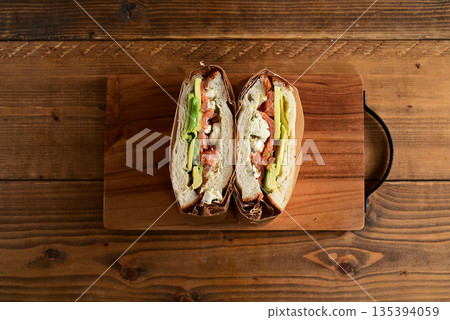 Avocado cream cheese salmon sandwich 135394059
