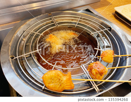 Deep-fried chicken fried in oil Deep-fried chicken fried in oil 135394268