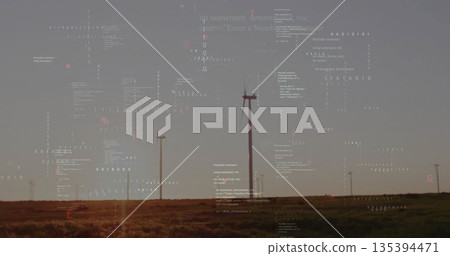 Showing central wind turbine tower rotating its blades on open prairie, with floating code overlays Showing central wind turbine tower rotating its blades on open prairie, with floating code overlays 135394471