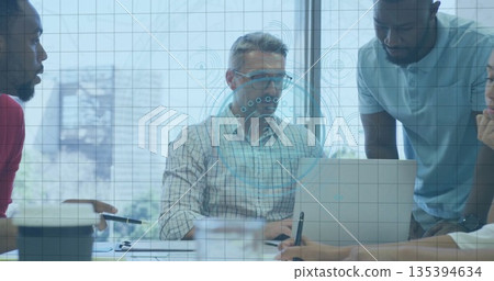 Collaborating team wearing business casual leaning on desk in modern office with laptop coffee cup Collaborating team wearing business casual leaning on desk in modern office with laptop coffee cup 135394634