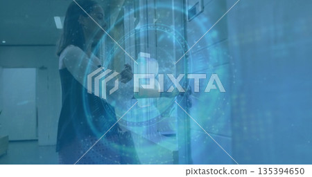 Scanning ID card, woman in black top using access reader in hallway with lockers, copy space Scanning ID card, woman in black top using access reader in hallway with lockers, copy space 135394650