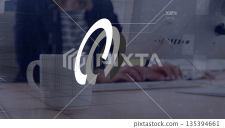 Typing worker wearing blazer at desk with mug, keyboard, monitor and 3D swirl labels alpha,beta,tau Typing worker wearing blazer at desk with mug, keyboard, monitor and 3D swirl labels alpha,beta,tau 135394661