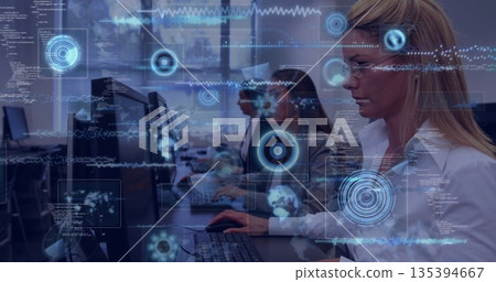 Typing blonde wearing glasses and white shirt at office desk with holographic graphics, copy space Typing blonde wearing glasses and white shirt at office desk with holographic graphics, copy space 135394667