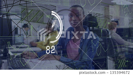 Woman in denim shirt analyzing holographic screens in control center, gauge showing 82 stock limit Woman in denim shirt analyzing holographic screens in control center, gauge showing 82 stock limit 135394672