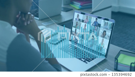 Man in grey shirt resting chin viewing meeting at desk, with laptop file organizer, copy space Man in grey shirt resting chin viewing meeting at desk, with laptop file organizer, copy space 135394692