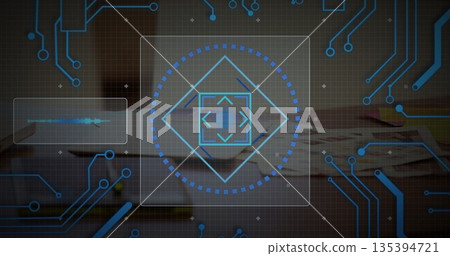 Hovering interface panel above wooden desk in office, showing diamond reticle and waveform 135394721