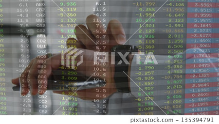 Stamping rubber date stamp using right hand over office desk, showing stock data overlay Stamping rubber date stamp using right hand over office desk, showing stock data overlay 135394791