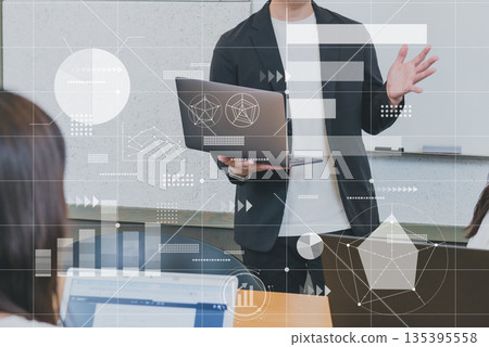 Business person giving a presentation with a laptop Business person giving a presentation with a laptop 135395558