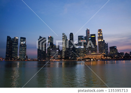 Beautiful view of Singapore's illuminated business district after sunset 135395713