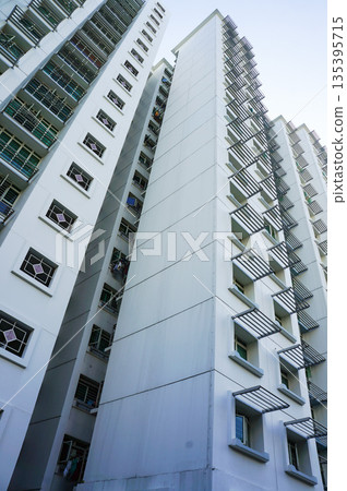 The exterior of a dilapidated high-rise building in a town overseas The exterior of a dilapidated high-rise building in a town overseas 135395715