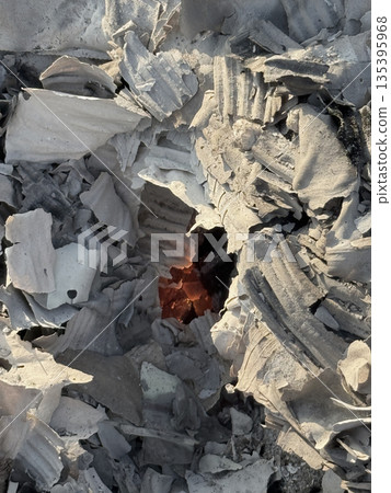 Ashes and flames after the fire 135395968