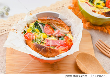 Easy quiche made with croissant dough 135396430