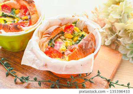 Easy quiche made with croissant dough 135396433