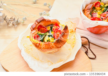 Easy quiche made with croissant dough 135396434
