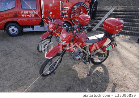 Firefighting motorcycle, fire engine, red bike Firefighting motorcycle, fire engine, red bike 135396859