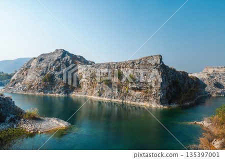 beautiful mountain range with  lake in the foreground 135397001