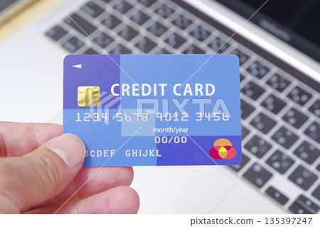 Credit card and computer Credit card and computer 135397247