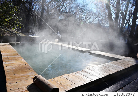 Scenery of an open-air bath, steam rising from a hot spring, hot springs flowing directly from the source, steamy open-air bath, hot spring image, image material Scenery of an open-air bath, steam rising from a hot spring, hot springs flowing directly from the source, steamy open-air bath, hot spring image, image material 135398078