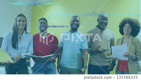 Business casual team presenting in meeting room, with binder, folder, laptop, documents, smartphone Business casual team presenting in meeting room, with binder, folder, laptop, documents, smartphone 135398335