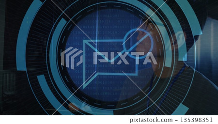 Technician monitoring racks in server room corridor, ID badge and digital interface, copy space 135398351