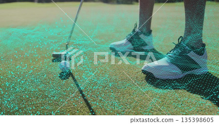 Aligning putter and golf ball on black line on putting green with data overlay, copy space 135398605