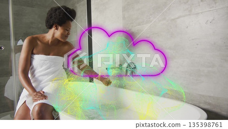 Towel-wrapped woman touching tub faucet in bathroom, with neon cloud, green point-cloud, copy space Towel-wrapped woman touching tub faucet in bathroom, with neon cloud, green point-cloud, copy space 135398761