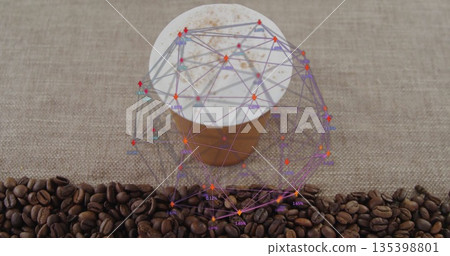 Sitting takeaway coffee cup with foam, network overlay on cafe table, beans and cinnamon sprinkles Sitting takeaway coffee cup with foam, network overlay on cafe table, beans and cinnamon sprinkles 135398801
