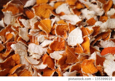 Photo of drying mandarin peels. Photo of drying mandarin peels. 135399010