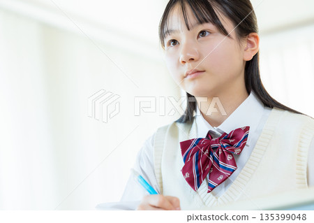 Junior high school girls studying at cram school Junior high school girls studying at cram school 135399048