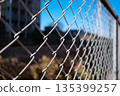 Railroad tracks over the fence 135399257