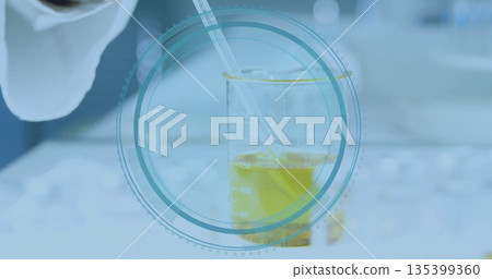 Pipetting yellow liquid into marked beaker on lab bench by gloved hand with circular overlay Pipetting yellow liquid into marked beaker on lab bench by gloved hand with circular overlay 135399360