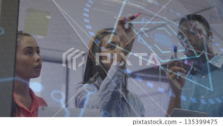 Sketching technical diagram on glass board in conference room, engineer using red and blue markers Sketching technical diagram on glass board in conference room, engineer using red and blue markers 135399475