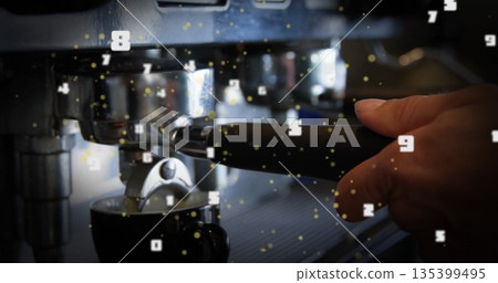 Barista securing portafilter into espresso group head in cafe, with cup on tray and digital effects Barista securing portafilter into espresso group head in cafe, with cup on tray and digital effects 135399495