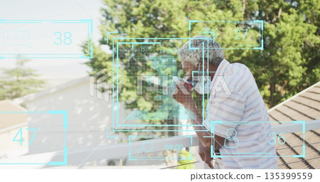 Leaning man wearing polo shirt on balcony railing sipping from mug with digital overlay, copy space Leaning man wearing polo shirt on balcony railing sipping from mug with digital overlay, copy space 135399559