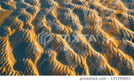 Abstract background of sand ripples spreading across the desert 135399601