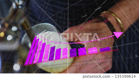 Bartender pouring draft beer into tilted pint glass at pub counter, with chart overlay Bartender pouring draft beer into tilted pint glass at pub counter, with chart overlay 135399614