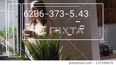 Holding white mug, woman wearing sweater standing by kitchen window, with potted plants and overlay Holding white mug, woman wearing sweater standing by kitchen window, with potted plants and overlay 135399676