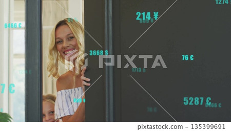 Peeking blonde mother and daughter around door frame at home, with turquoise symbols, copy space Peeking blonde mother and daughter around door frame at home, with turquoise symbols, copy space 135399691